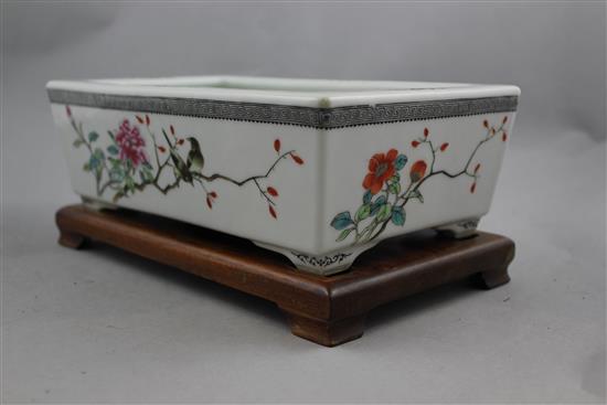 A Chinese famille rose rectangular narcissus bowl, Qianlong mark, Republic period, 24.5cm, wood stand